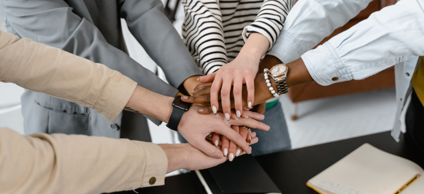 commission teamwork hands
